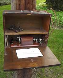 Wrecking set attached to a telegraph pole.